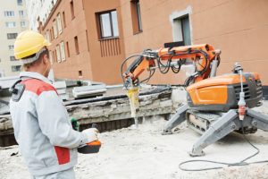 Portland excavation worker using a demolition machine